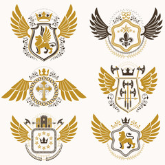 Fototapeta na wymiar Heraldic emblems with wings isolated on white backdrop. Collecti