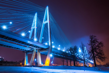 Night Bridge with lights. Cable-stayed bridge.
