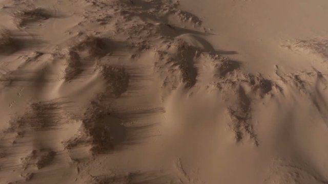 The unique sandy barkhan SariKum in Russia. Aerial view.