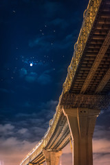 Motorway at night. Expressway over the city.