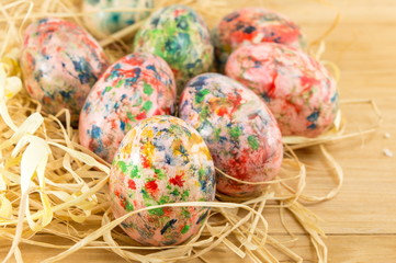Painted Easter eggs on a straw nest
