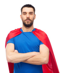 man in red superhero cape © Syda Productions