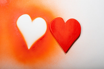 Holidays gift and heart on a white background.