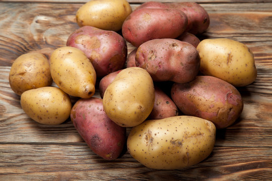 Potatoes on a rustic background