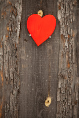 Red heart on a rustic wooden background. St. Valentine's Day