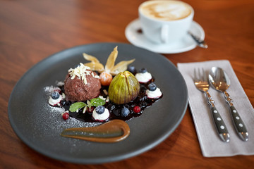 chocolate ice cream dessert on plate at restaurant