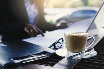 coffee for woman working outside office