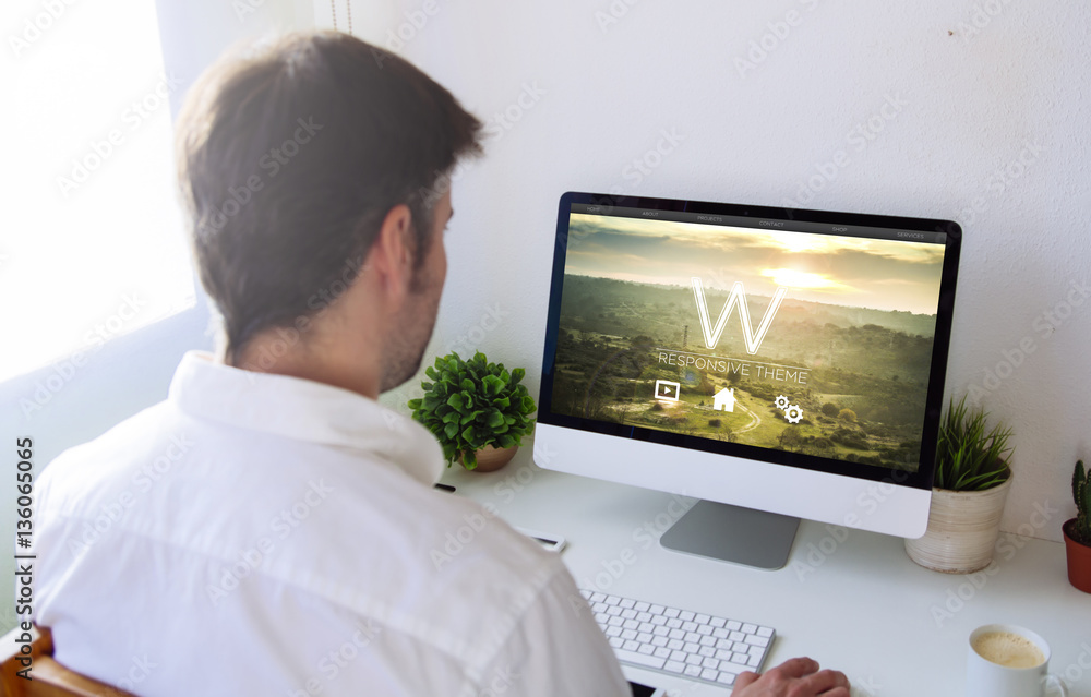 Poster man using cms on computer