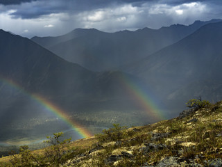 RAINBOWS AND RAIN IN THE MOUNTAINS