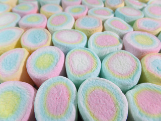 Lined up Pastel Blue, Pink, Yellow Colored Marshmallows, Closed up for Background, Banner, Texture