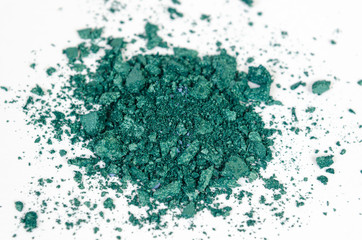 cosmetics shadows scattered on a white background