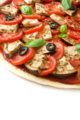 Vegetarian pizza with eggplant, tomato, black olives, oregano and basil isolated on white background