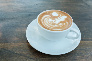 Hot coffee on table.