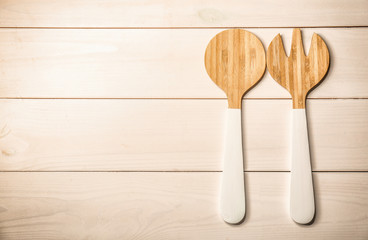 Kitchen utensils on wooden table