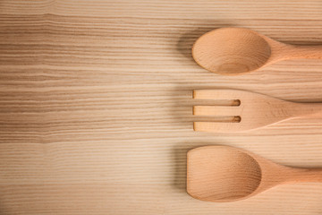 Kitchen utensils on wooden table