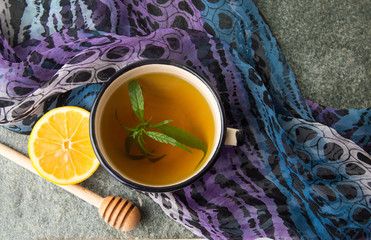 Cannabis herbal tea on stone table