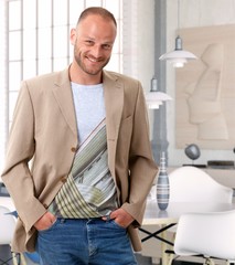 Happy casual man at home