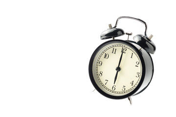 black vintage alarm clock isolated floating on white background