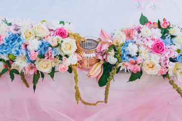 Table set for wedding or another catered event dinner. Decoration arch flowers gift box.