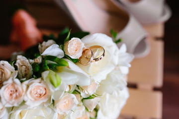 Wedding rings on flowers