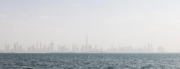 Fototapeten Panoramic view of Dubai city from the sea © tostphoto