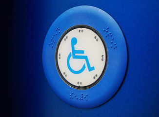 Bus button with wheelchair
