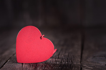 Heart shapes on rustic wooden background