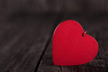 Heart shapes on rustic wooden background