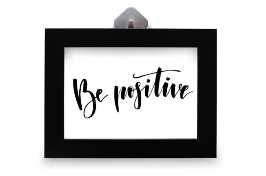 Be positive. Handwritten text. Modern calligraphy. Black photo frame