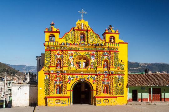 Church facade in San Andres Xecul town, Guatemala