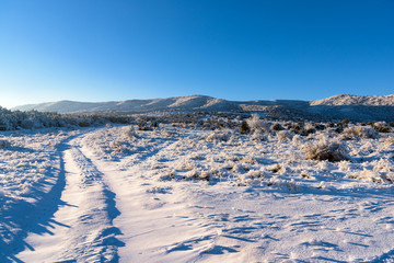 winter road leads to mountain, landscape