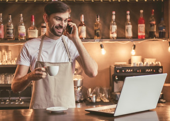 Handsome barista working