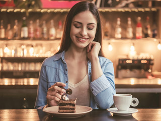 Beautiful girl at the cafe