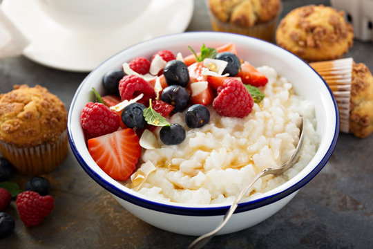 Rice Pudding With Fresh Berries And Coconut For Breakfast