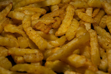 New fried fries on a plate ready to be served