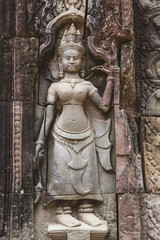Fototapeta na wymiar Carved structure and relief in Angkor Wat Temple
