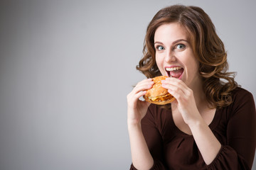 Young woman with hamburger