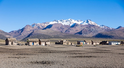 Small village of shepherds of llamas in the Andean mountains. The Sajama National Park is a...