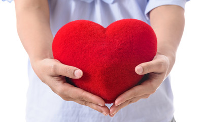 Closeup of  woman hold red heart
