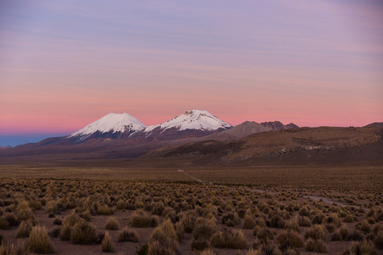 Sunset in Andes. Parinacota and Pomerade volcanos.