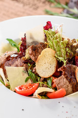Meat salad with tomato
