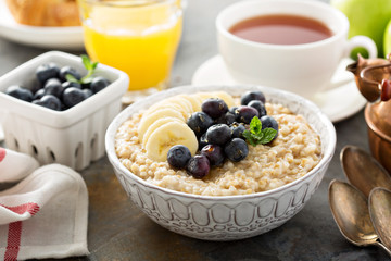 Steel cut oatmeal porridge with banana and blueberry