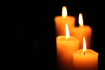 Fototapeta na wymiar four candles right on stairs