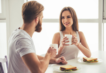 Obraz na płótnie Canvas Couple having a breakfast