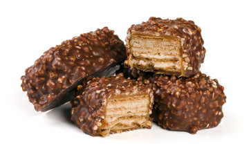 chocolate candy with nuts isolated on white background