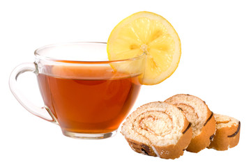 slices of biscuit roll with a cup of tea isolated on white background closeup