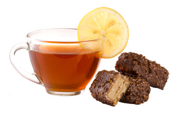 chocolate candy with a cup of tea isolated on white background
