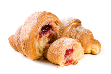croissant and half with cherry jam powdered sugar isolated on white background closeup