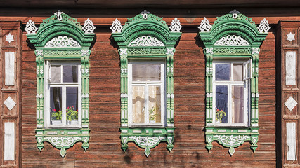 facade Russian house with carved architraves