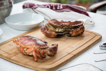 Preparing cooked crab